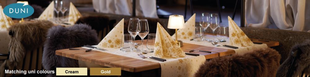 Duni Stargazing Cream - Duni Stargazing Cream design from Duni, new for 2025. Christmas napkins, slipcovers, tablecovers, banquet rolls, tete-a-tete rolls, table runners and placemats from Duni. The matching Duni uni colours for this christmas design are Cream & Gold.